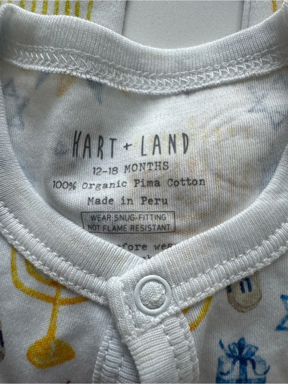 Holiday-Themed Infant Footed Pajama Coverall - White with Blue & Gold Prints